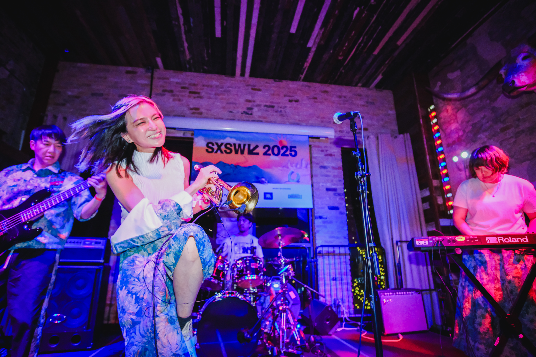 ROUTE14band members with instruments including trumpet